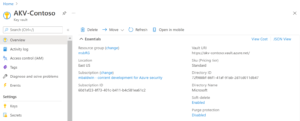 Screenshot of Azure Key Vault overview page showing details like location, subscription, vault URI, and directory settings.