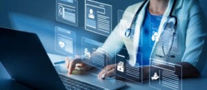 Doctor accessing digital medical records on a laptop with floating health data icons, representing modern healthcare technology.