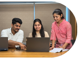 Team of software developers and QA Analysts working at the Best IT Software Development Company in India - Triveni.