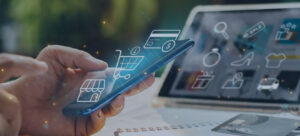 Person using smartphone for online shopping with digital icons representing e-commerce, payments, and delivery logistics.